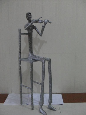 Manufacturers Exporters and Wholesale Suppliers of Sculptor Sitting Violen S-75 CM Moradabad Uttar Pradesh